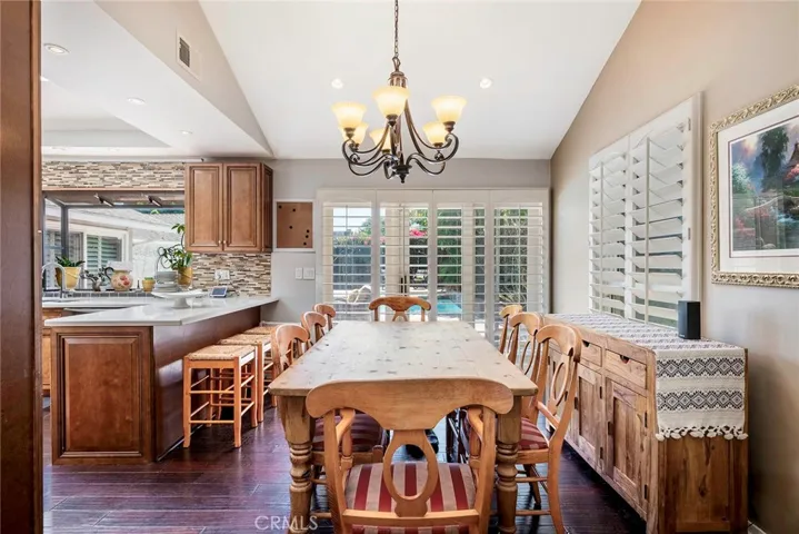 Dining area overlooks the backyard.