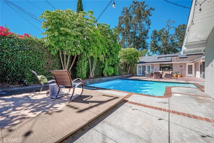 Sparking pool and raised Trex deck.