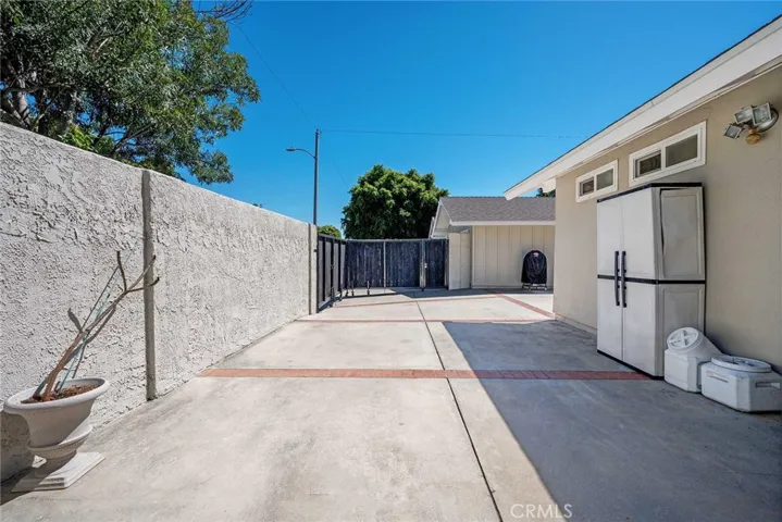 Large gated side yard.