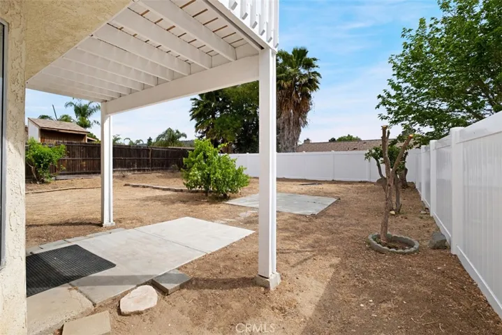 Backyard with Patio and Balcony.
