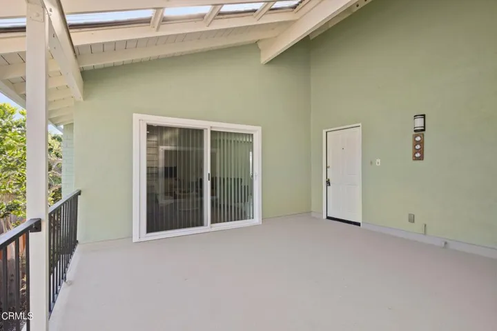Entrance and patio to upper unit
