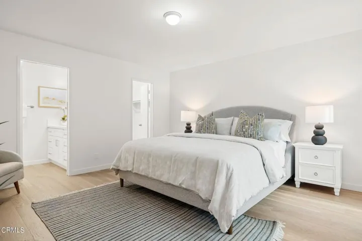 Primary bedroom with walk-in closet