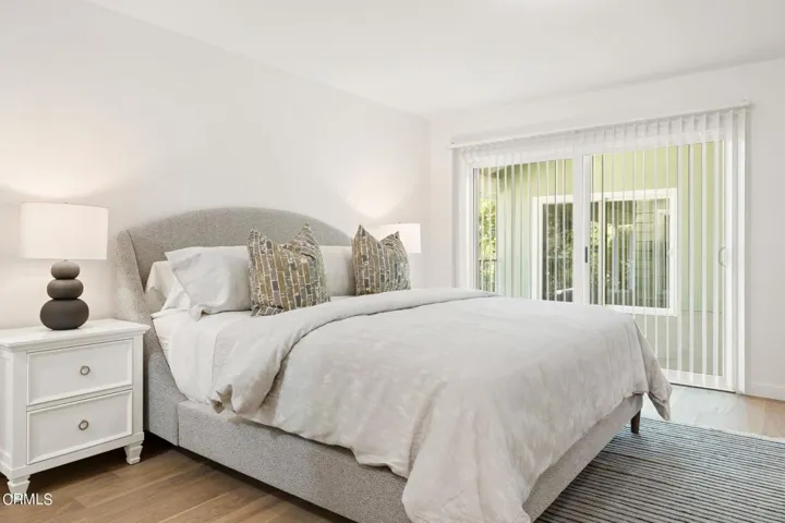 Primary bedroom opens to outdoor patio