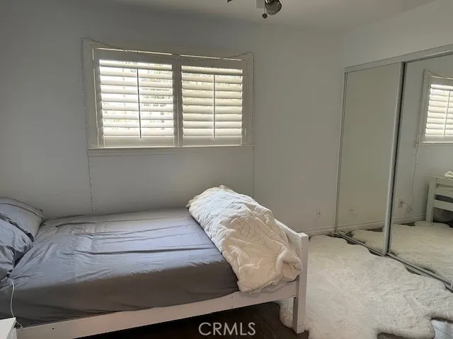 Second Level Bedroom with mirrored wardrobe closets