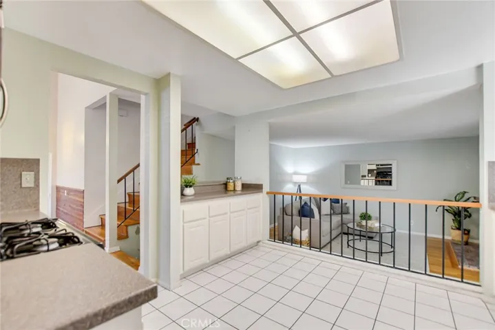 Nice flowing floor plan from kitchen area steps down to family room and a half bath.