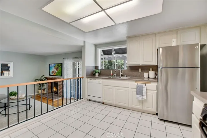 Kitchen area opens to Family room.