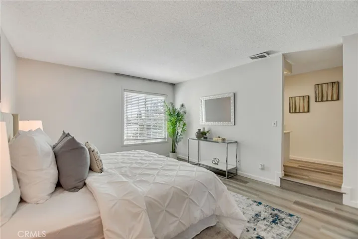 Master bedroom suite with step up to master bathroom.
