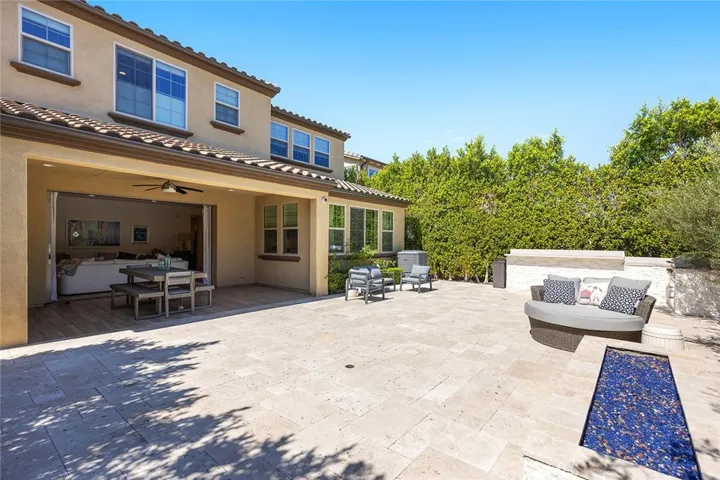 Large outdoor patio with private fire pit and barbecue