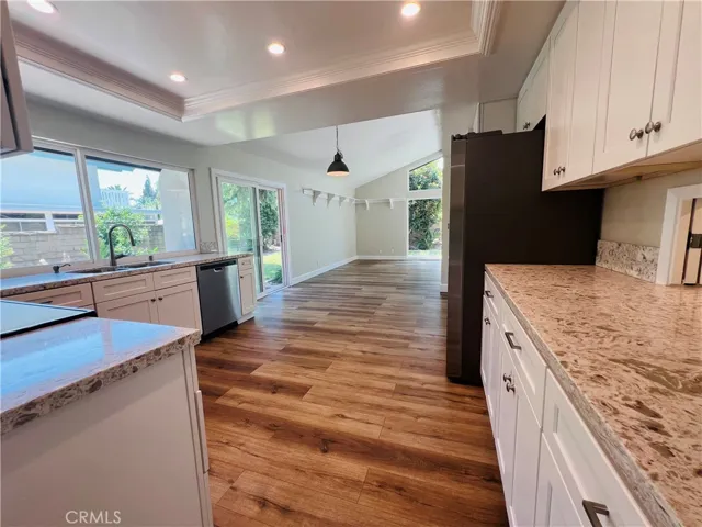 From the dining room into the kitchen...