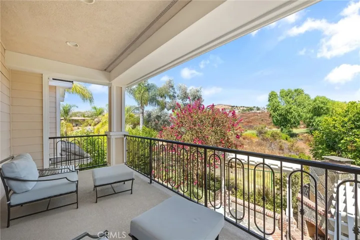 spacious master balcony retreat with picturesque views of the bird sanctuary and golf course.