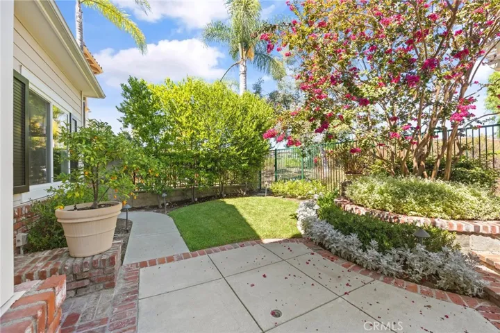 lush backyard with room for a jacuzzi or possible pool.