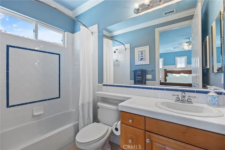 ensuite bathroom with soaking tub and shower.