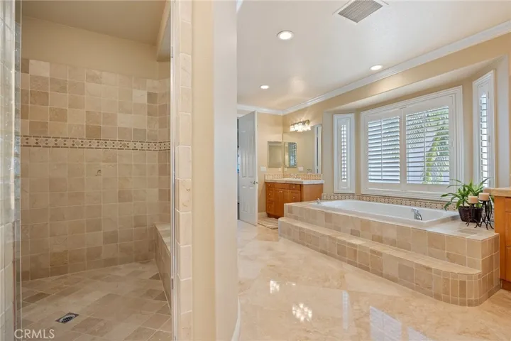 oversized walk in shower with seat.