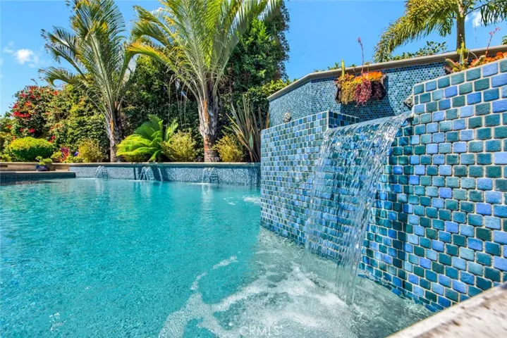 Waterfall Flowing from Spa to Pool
