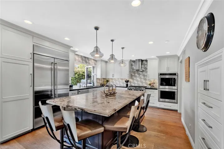 Center Island with Wrap-Around Seating, Custom Soft-Closing Cabinetry​​‌​​​​‌​​‌‌​​‌​​​‌‌​​​‌​​‌‌​​‌‌​​‌‌​​​​ w/Pull-Outs