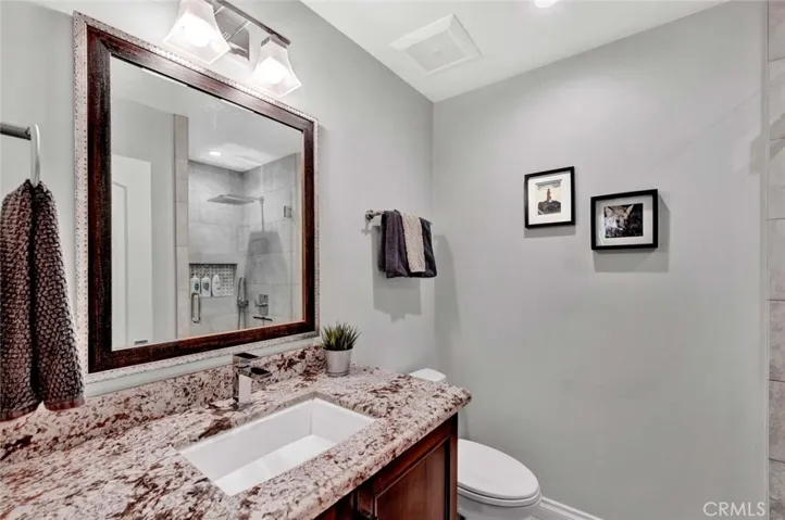 Remodeled Downstairs Bathroom with Walk-In Shower