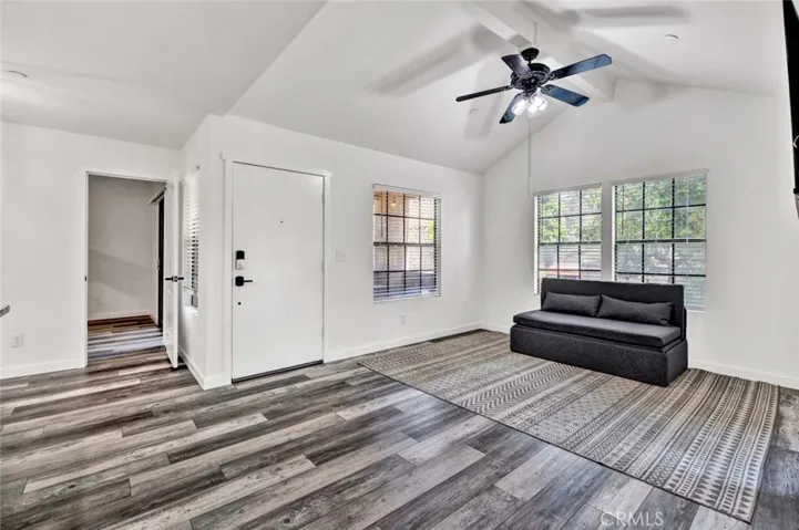 Front door entry and looking into the second master bedroom.