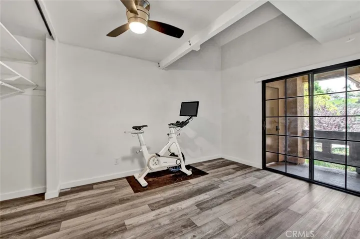Another view of second bedroom with upgraded fan.