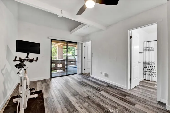 View from second bedroom into balcony and second bathroom.