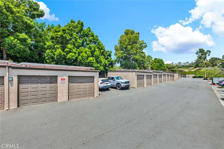 1 car garage close to unit plus 1 extra parking open parking space.  Plenty of guest parking.