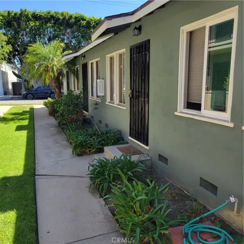Pleasant courtyard entry to front doors.
