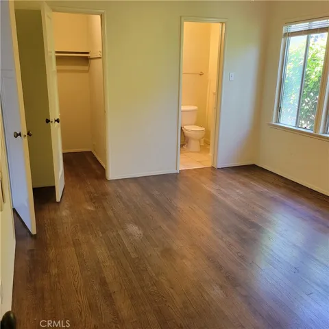 #F - Bedroom, hardwood floors.