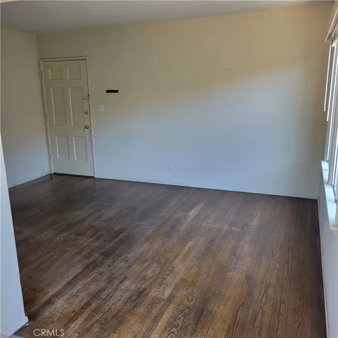 #F - Living room with hardwood floors.