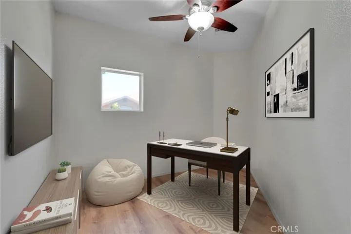VIRTUALLY STAGED! Alcove/ bonus space staged as an office