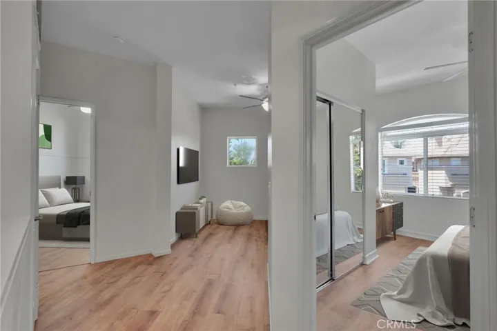 VIRTUALLY STAGED! Top of the stairs view.