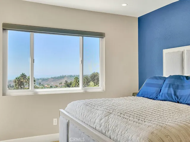 The primary bedroom has a stunning panoramic view.
