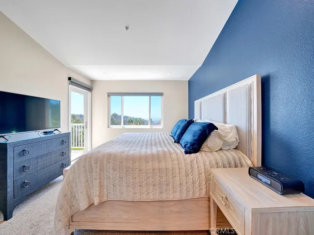 Another view of the primary bedroom showcasing the unobstructed view.