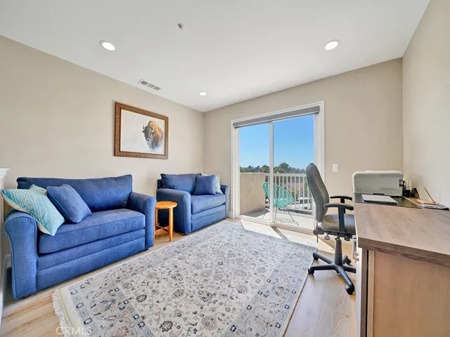 The upstairs loft has engineered wood floors and a beautiful view.
