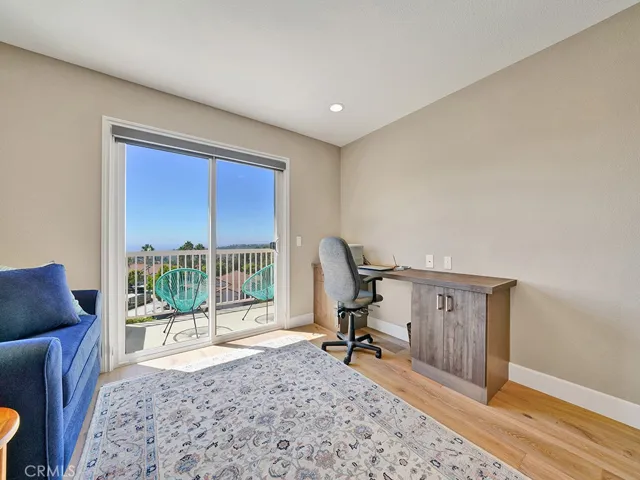 Another view of the loft which has a built in desk.