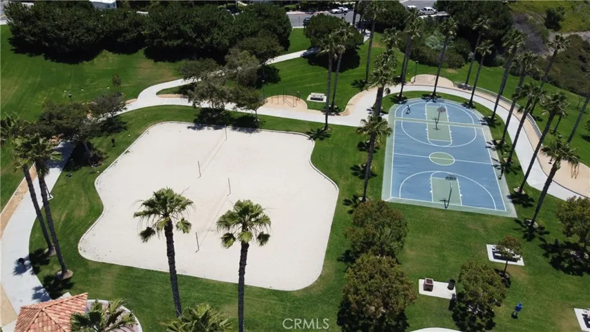 Drone shot of the beach volleyball and basketball courts at Rancho San Clemente Sports Park.
