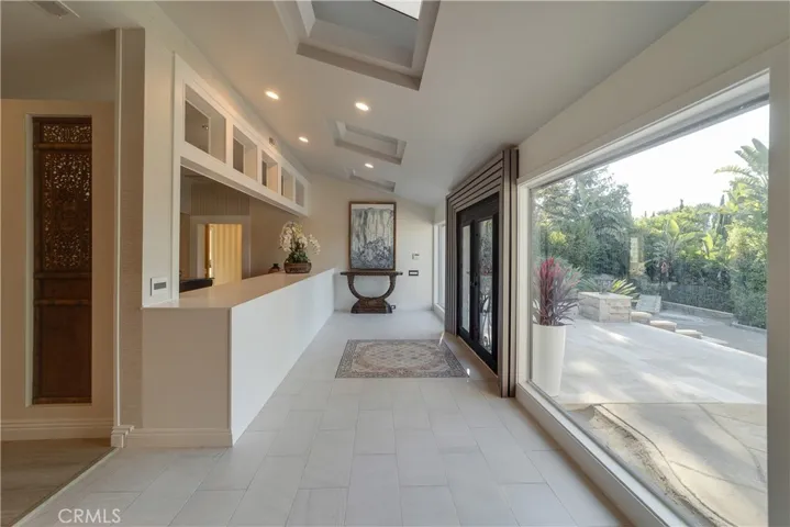 A large foyer with two picture windows.