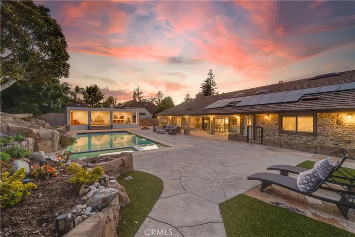 Amazing twilight view of the backyard.