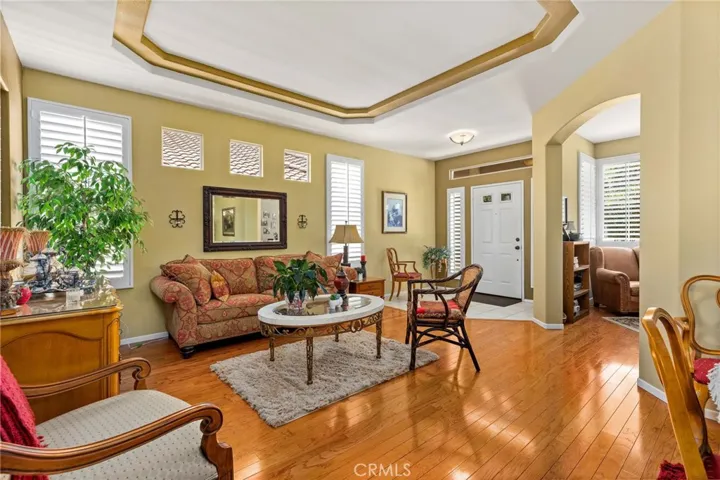 Living room with view of Entry & Den