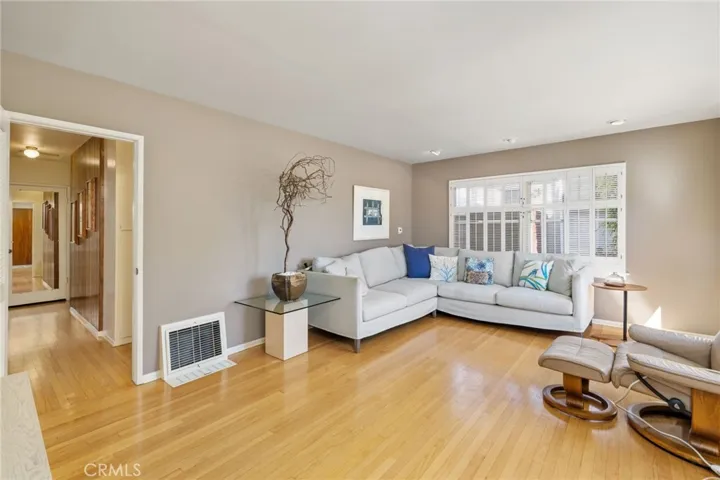 Spacious living room with hardwood floors