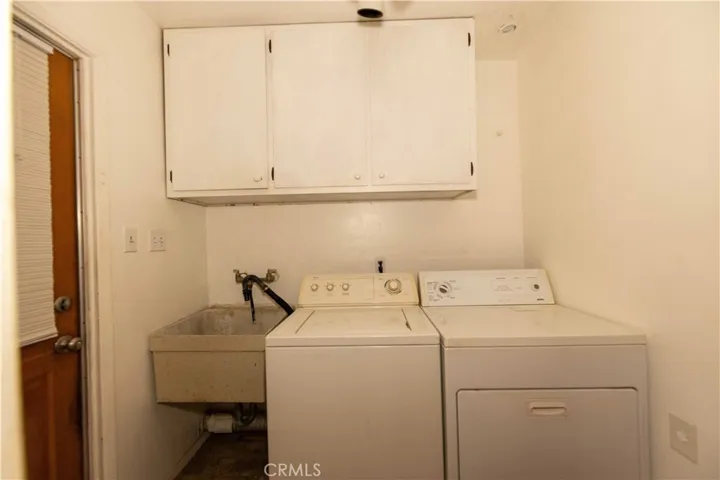 Laundry area. This door goes to the side of the house.