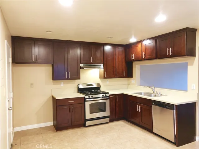Upgraded Kitchen with Door Leading to Attached Garage