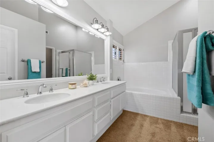 Ensuite Bathroom complete with soaking tub, shower and private toilet room.