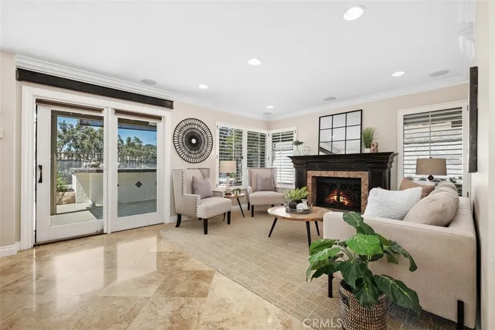 The family room light, bright and airy offering direct access to the outdoor living space.