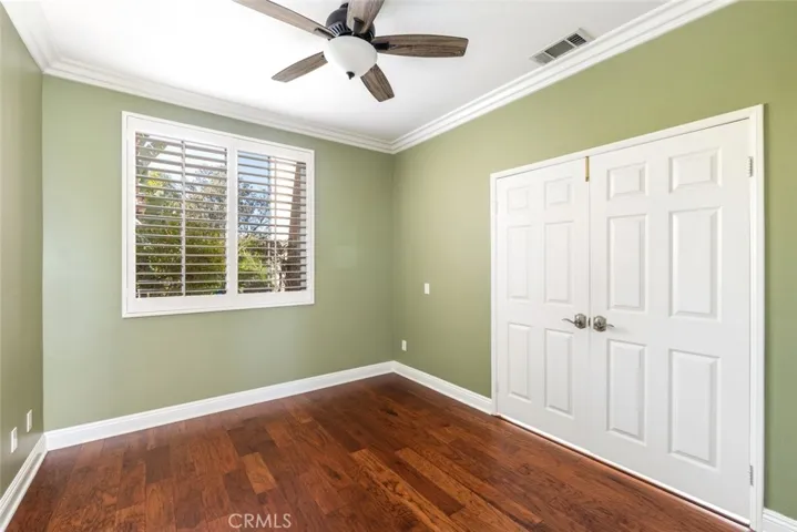 This versatile room is ideal for use as a home office or guest bedroom.