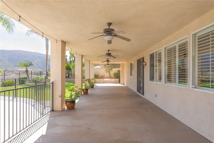California room spans the length of the house, includes fans and roll down shade