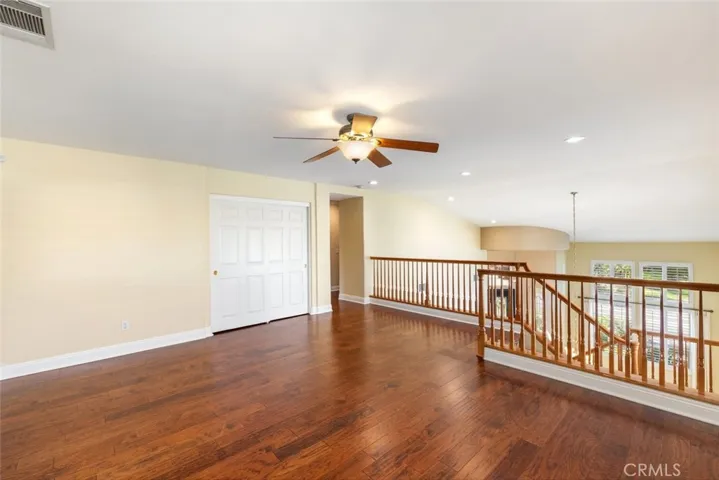 The spacious upstairs bonus room provides an ideal area for additional entertaining or a family game room.