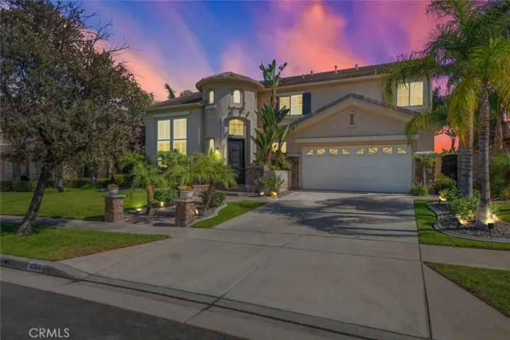 Located in a prestigious neighborhood, this stunning home features an elegant architecture and lush landscaping.