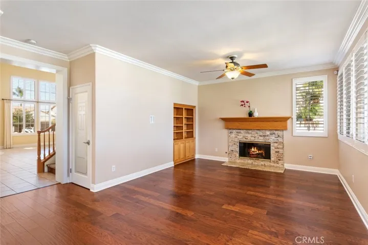 The cozy family room offers a serene atmosphere ideal for entertaining.