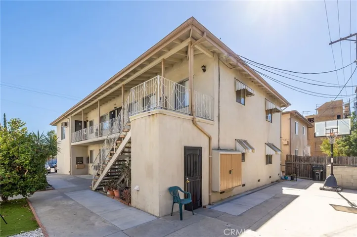 Rear View of 6107 Tujunga Avenue - Well Maintained Building with Low-Maintenance Grounds; Door to Laundry Room