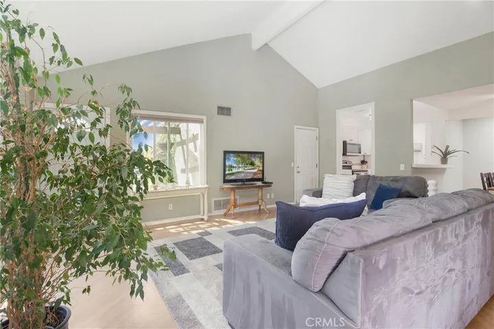 Great room with high, beamed ceiling