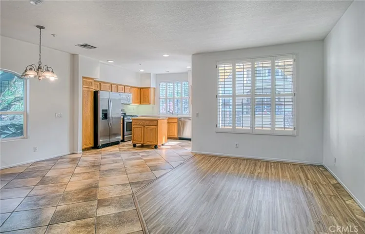 From entryway, living area, dining area and kitchen.